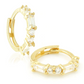 9ct Baguette Gem Huggies from Ella Ray Jewellery: Elegant, versatile huggie earrings crafted from 9ct gold with sparkling baguette-cut gems in a variety of colors, perfect for everyday glamour.
