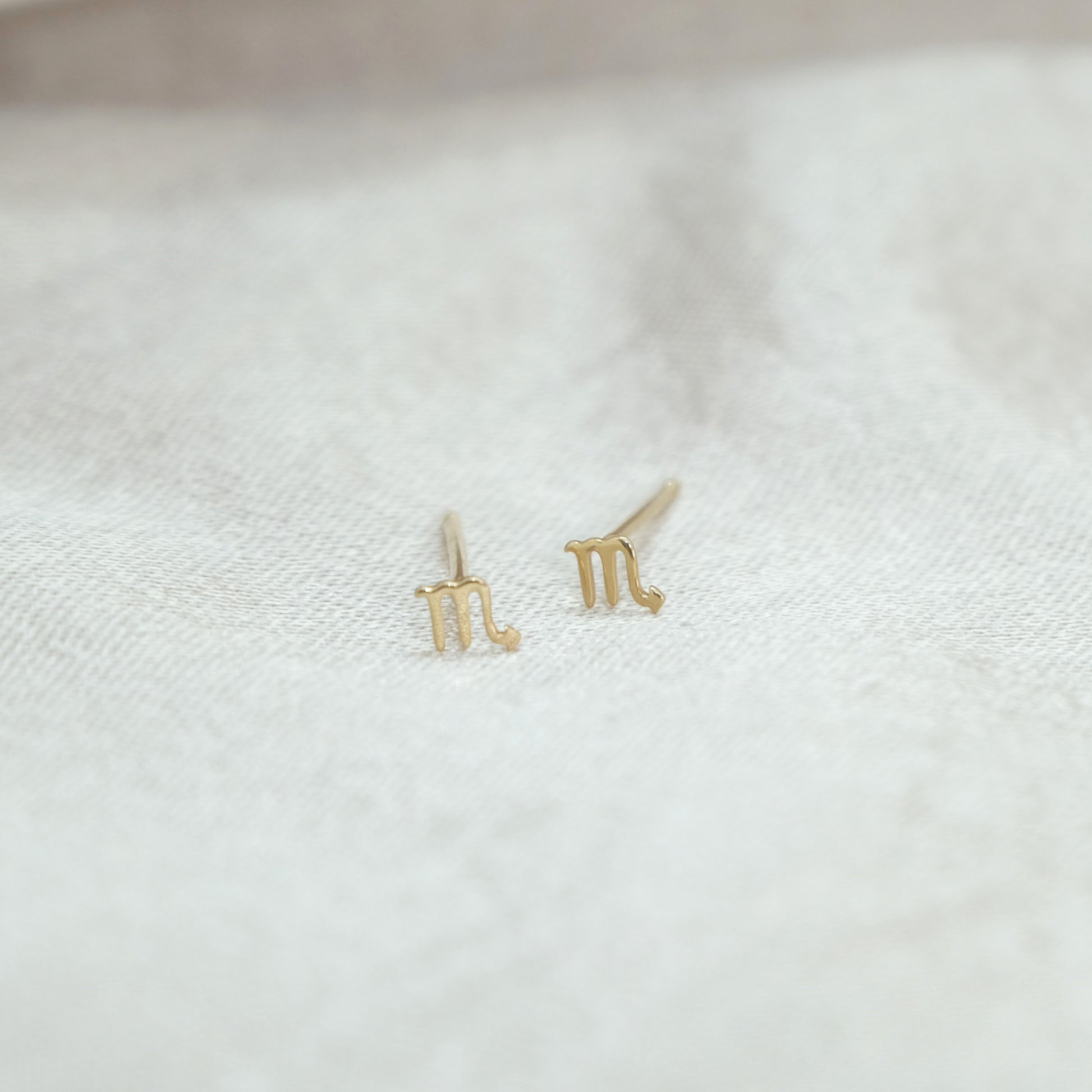 14ct Scorpio Stud Earrings from Ella Ray Jewellery: Stylish stud earrings crafted from 14ct gold, featuring a distinctive Scorpio zodiac symbol design, perfect for expressing individuality and astrological significance in your accessory collection.