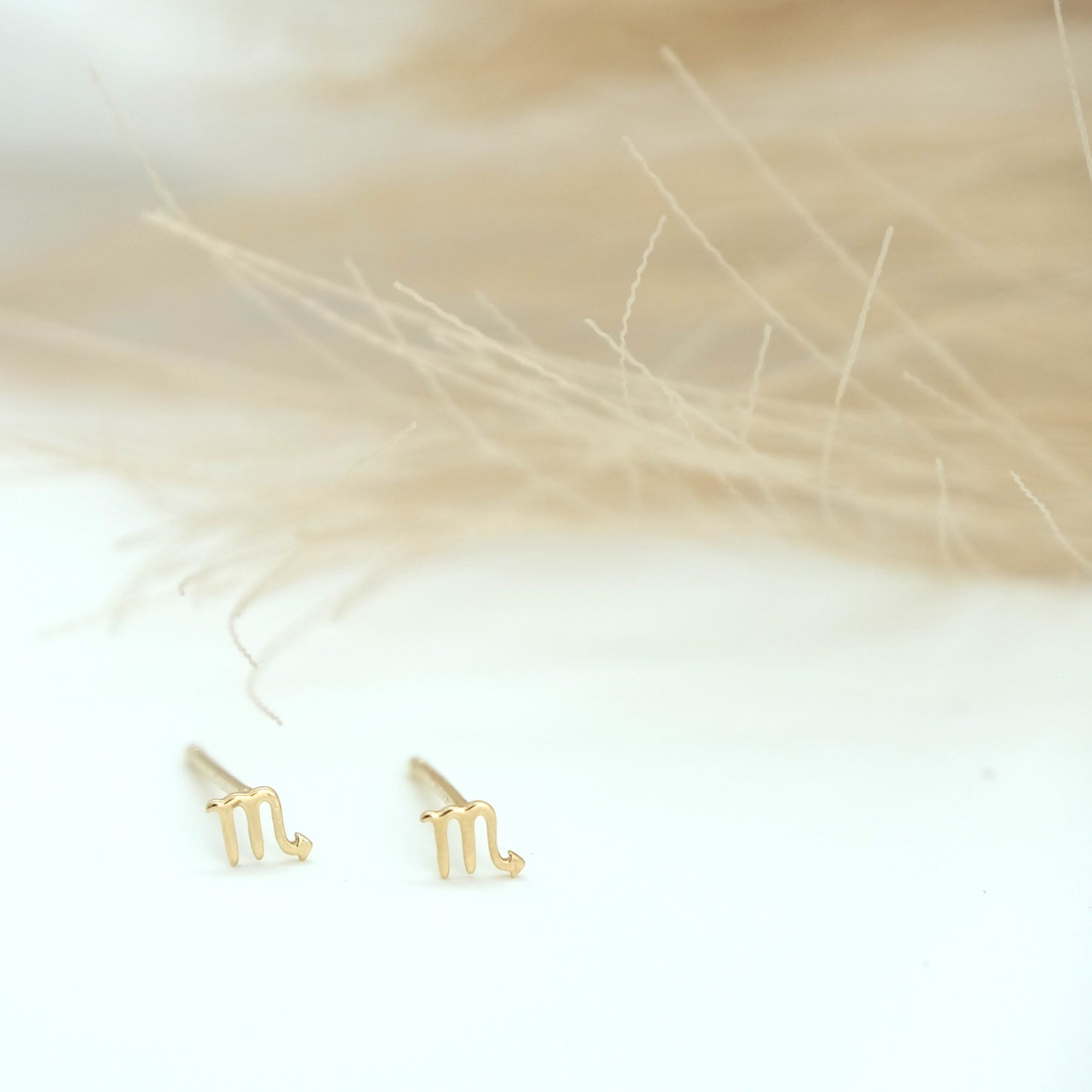 14ct Scorpio Stud Earrings from Ella Ray Jewellery: Stylish stud earrings crafted from 14ct gold, featuring a distinctive Scorpio zodiac symbol design, perfect for expressing individuality and astrological significance in your accessory collection.