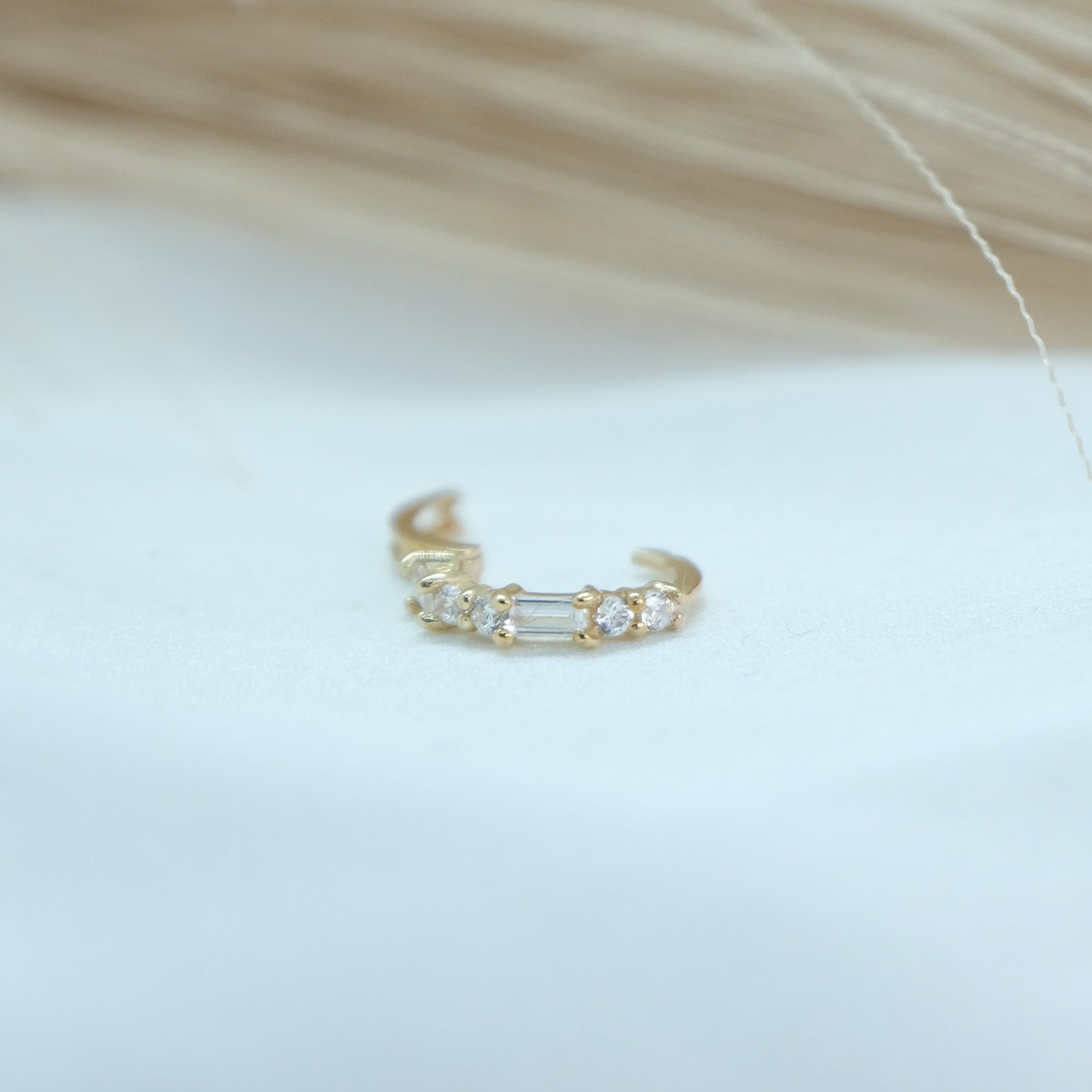 9ct Baguette Gem Huggies from Ella Ray Jewellery: Elegant, versatile huggie earrings crafted from 9ct gold with sparkling baguette-cut gems in a variety of colors, perfect for everyday glamour.