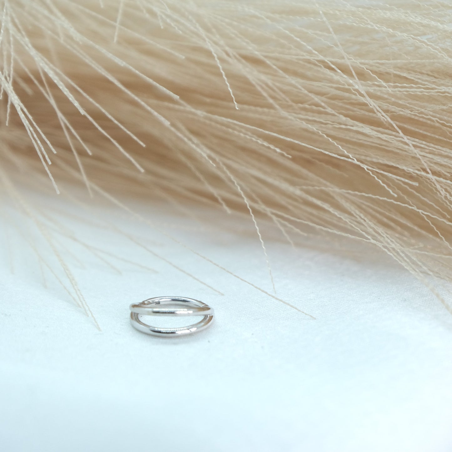 9ct Gold Double Band Hinge Ring showcasing a stylish double band design with a hinge mechanism for a modern and sophisticated look. Perfect for adding a chic touch to any outfit.