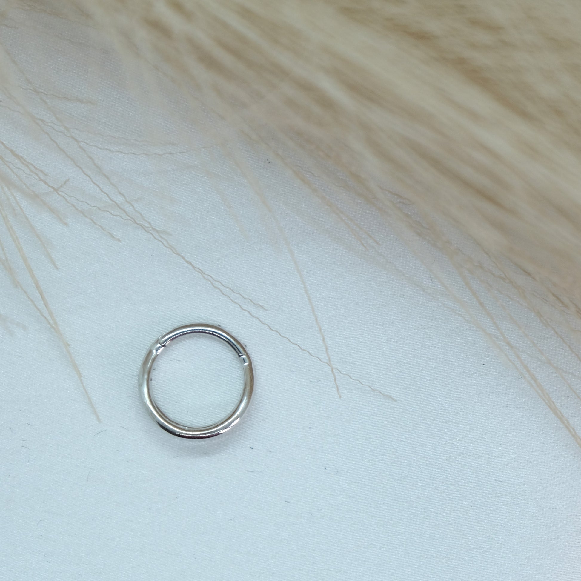 9ct Gold Double Band Hinge Ring showcasing a stylish double band design with a hinge mechanism for a modern and sophisticated look. Perfect for adding a chic touch to any outfit.