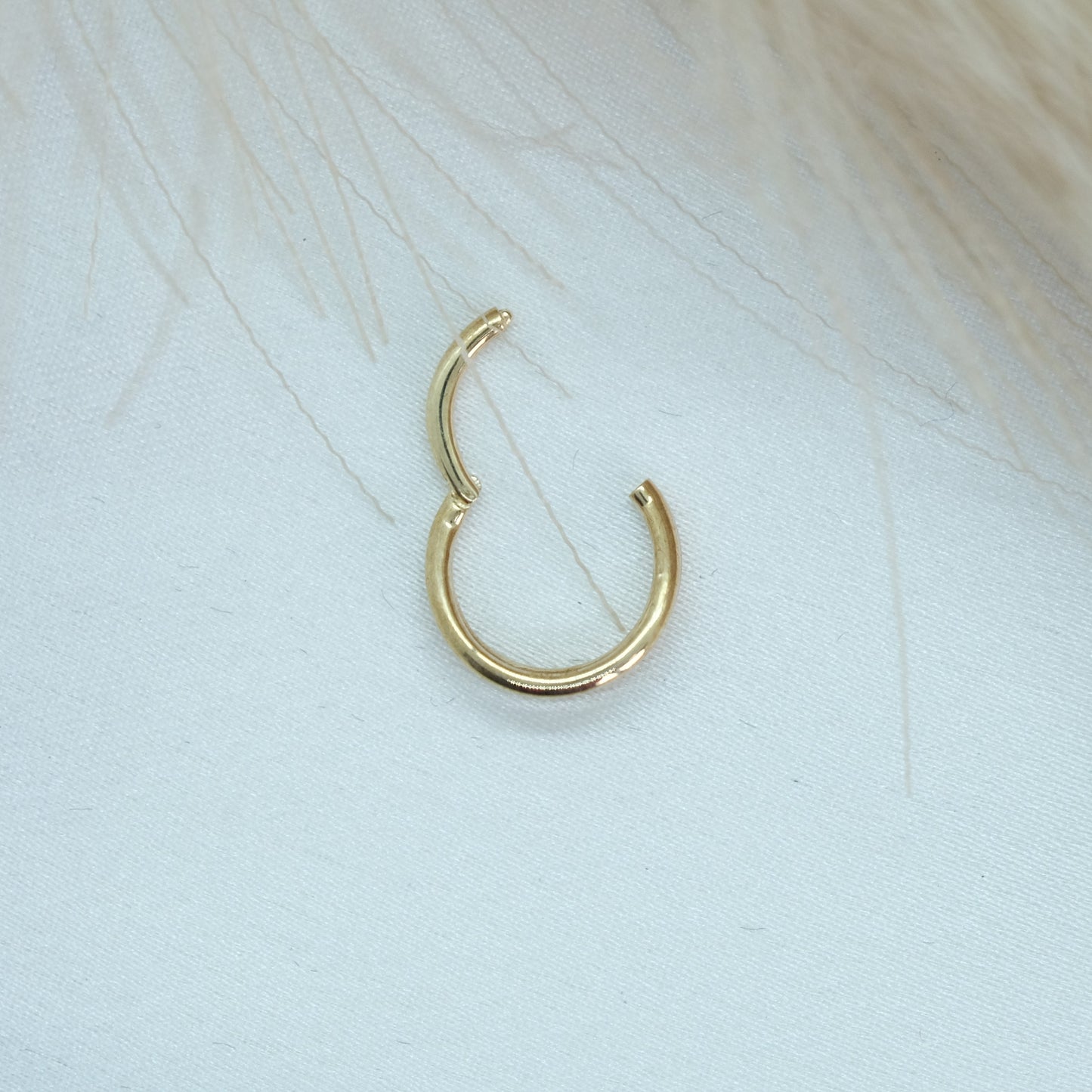 9ct Gold Double Band Hinge Ring showcasing a stylish double band design with a hinge mechanism for a modern and sophisticated look. Perfect for adding a chic touch to any outfit.