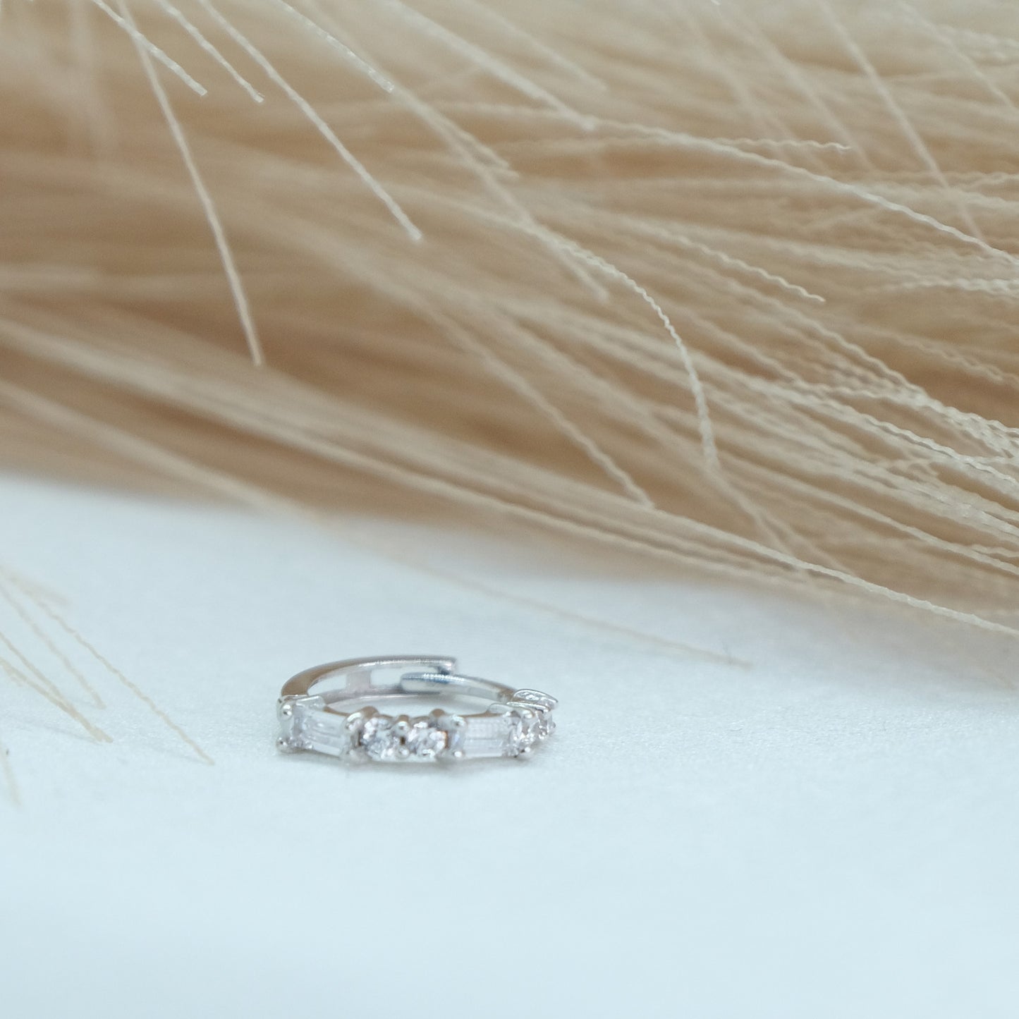 9ct Baguette Gem Huggies from Ella Ray Jewellery: Elegant, versatile huggie earrings crafted from 9ct gold with sparkling baguette-cut gems in a variety of colors, perfect for everyday glamour.