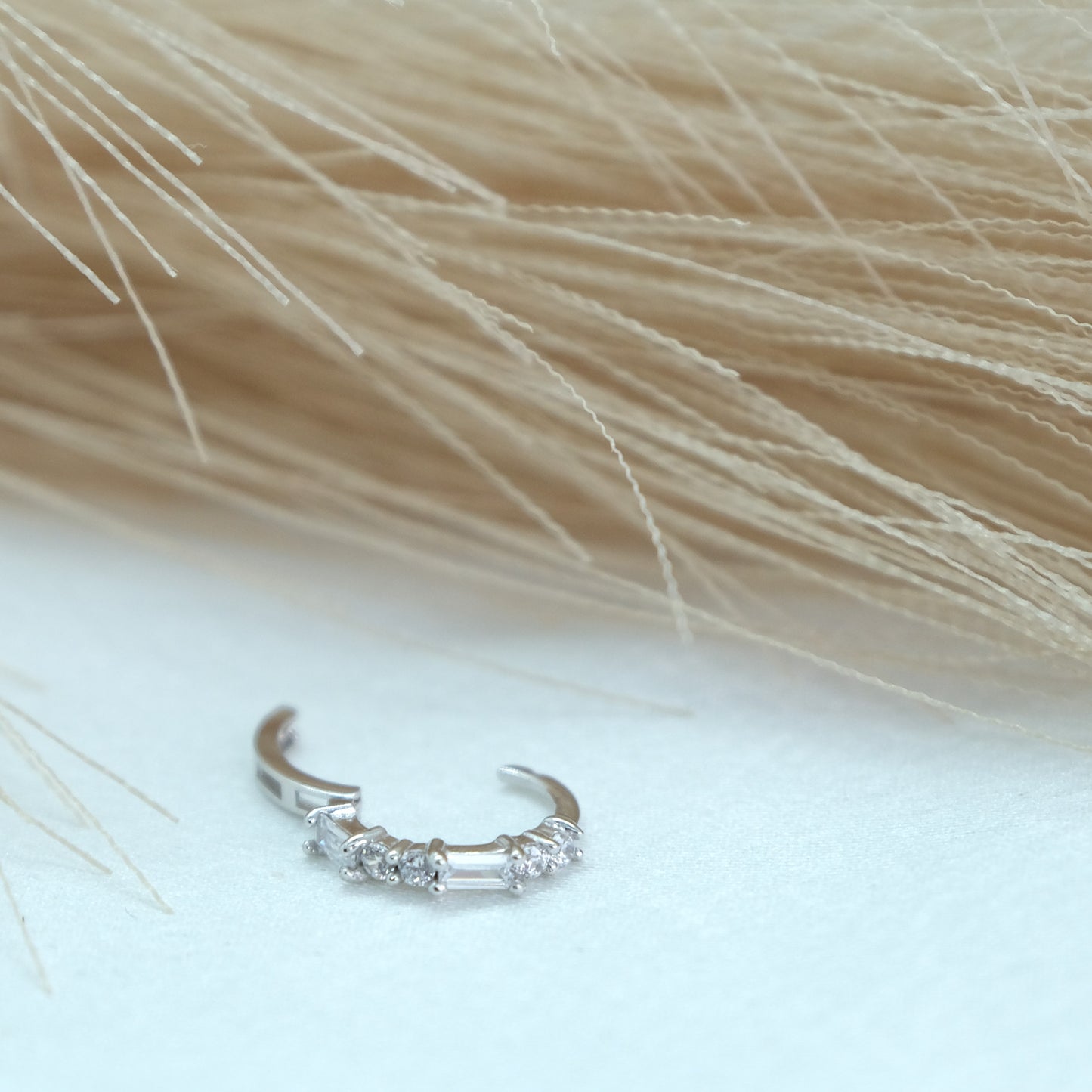 9ct Baguette Gem Huggies from Ella Ray Jewellery: Elegant, versatile huggie earrings crafted from 9ct gold with sparkling baguette-cut gems in a variety of colors, perfect for everyday glamour.