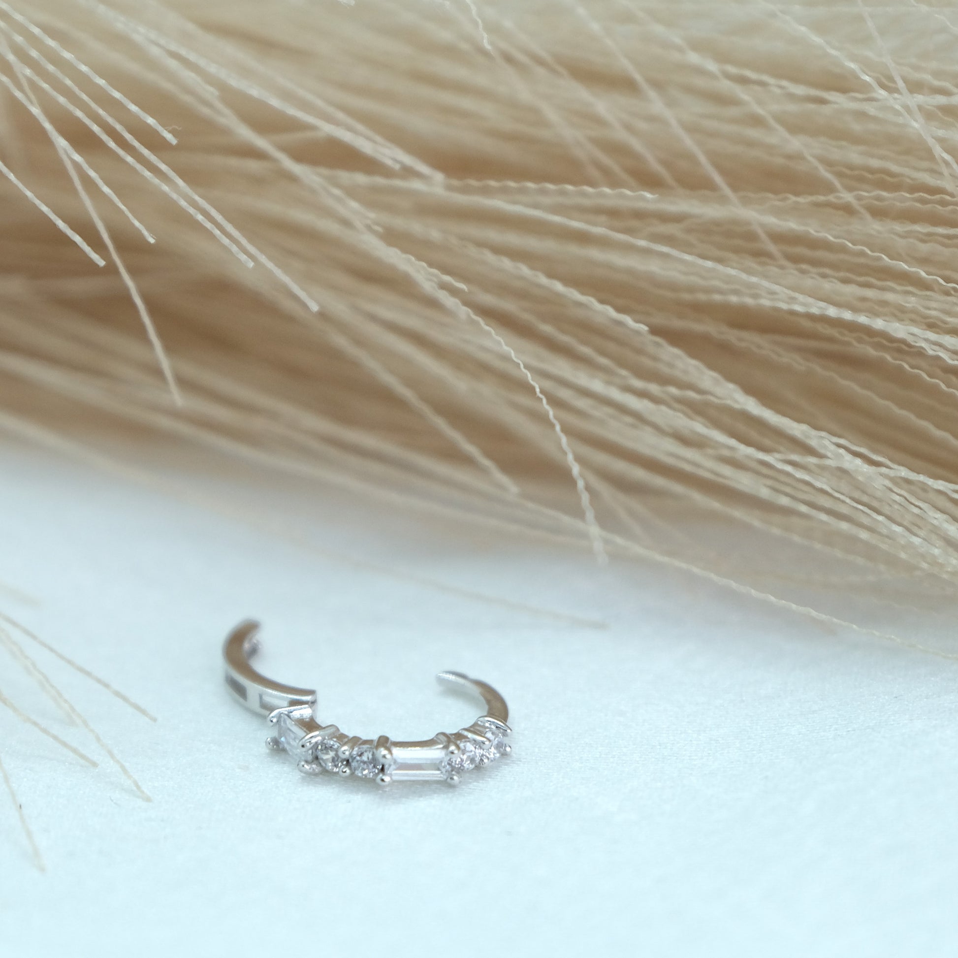 9ct Baguette Gem Huggies from Ella Ray Jewellery: Elegant, versatile huggie earrings crafted from 9ct gold with sparkling baguette-cut gems in a variety of colors, perfect for everyday glamour.